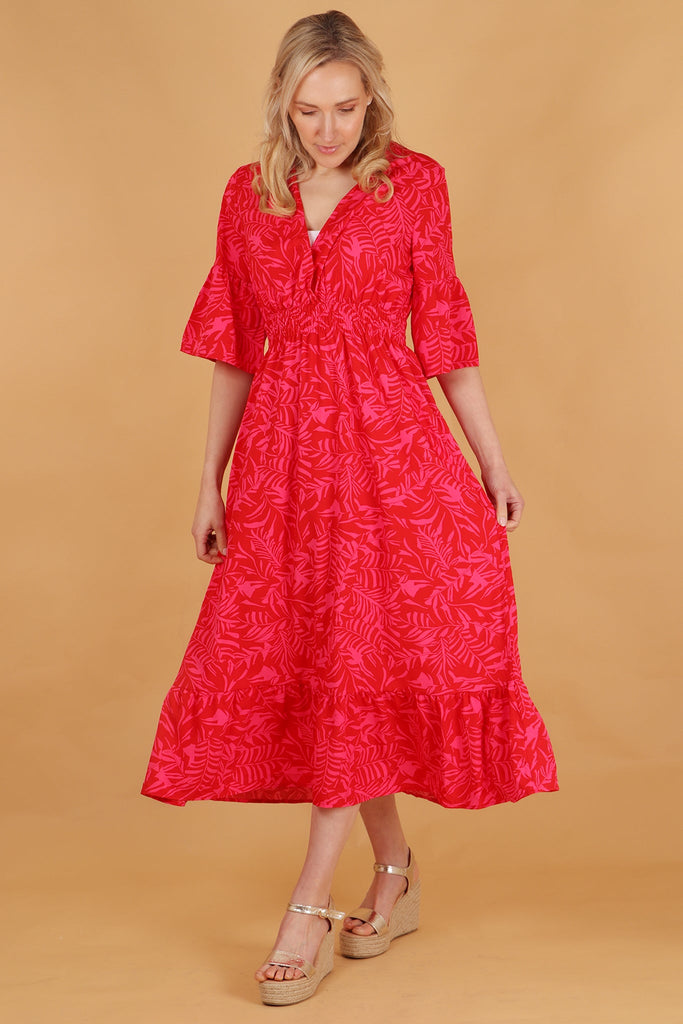 model showing the loose fitting flowy skirt of the maxi dress