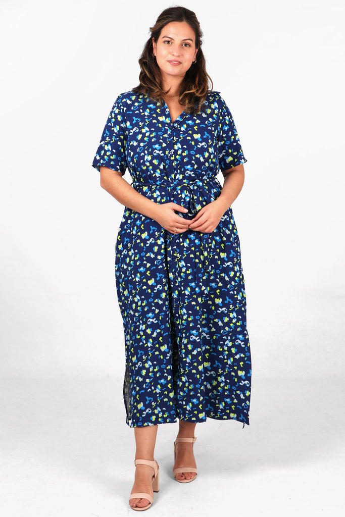 blue abstract print shirt dress with button down front fastening and short sleeves