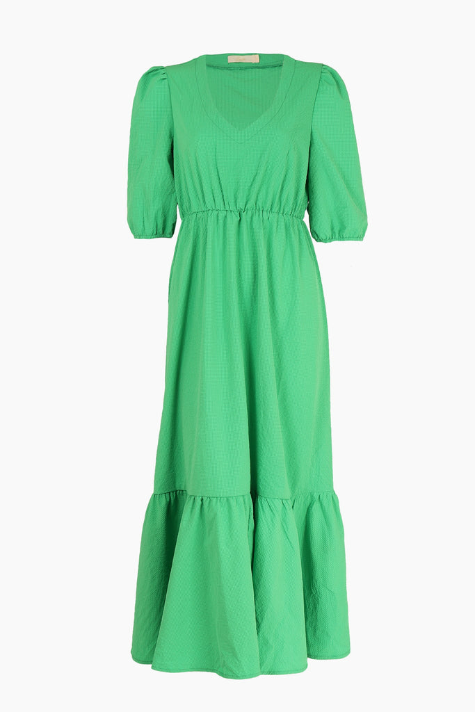 midaxi length tiered v neck dress in a textured green material 