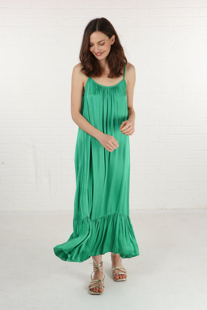 plain green maxi sundress with thin shoulder straps and a loose fitting design