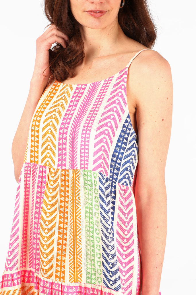 close up of the colourful aztec print pattern on the cotton maxi dress