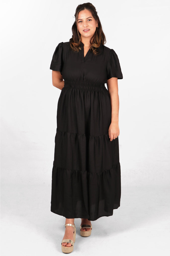 long black tiered dress with short sleeves in plain black
