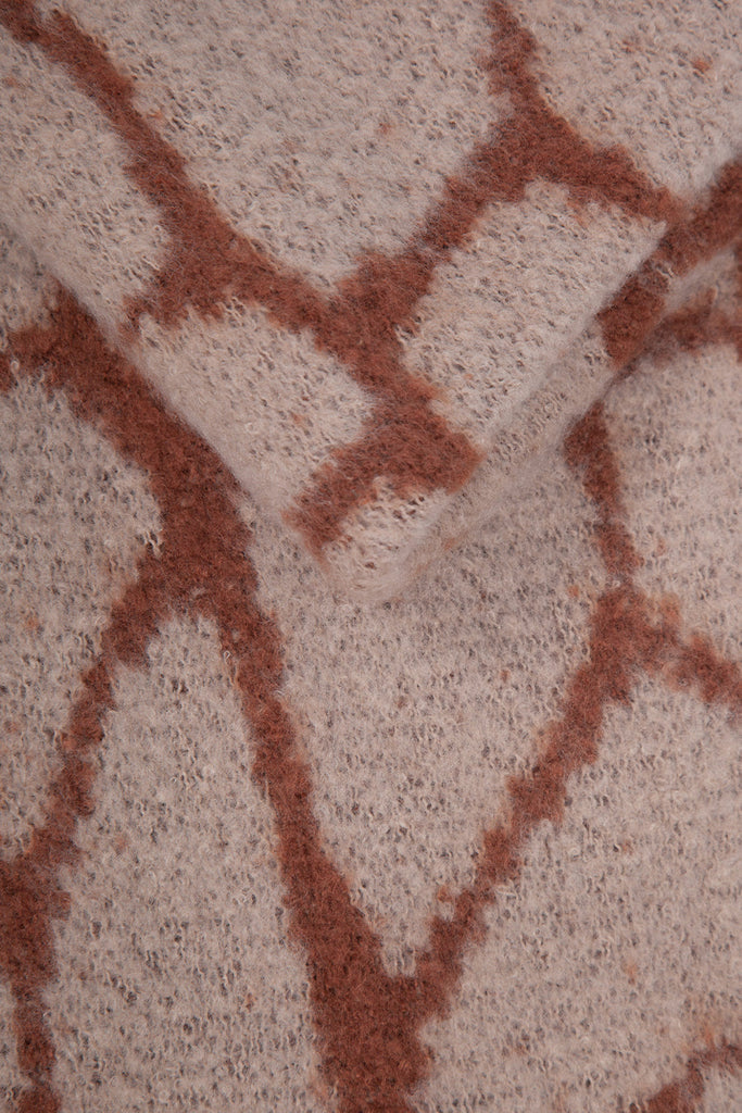 close up of the fabric and giraffe print