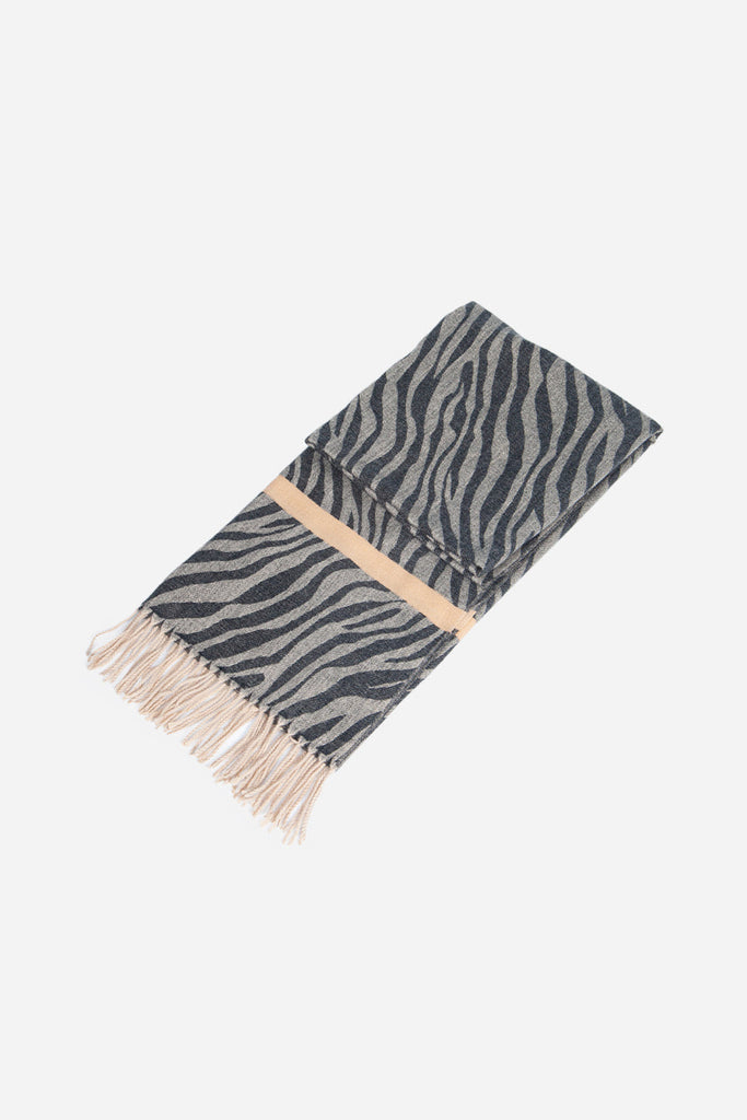 scarf laying flat and folded showing the zebra print patten