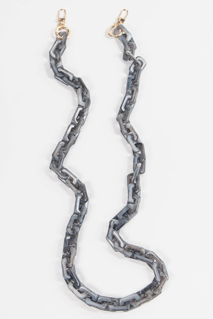 grey acrylic bag strap with gold hardware