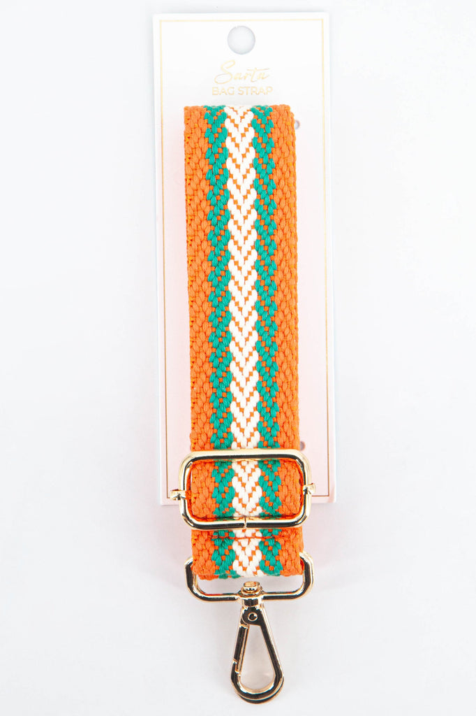 orange and green woven cross body bag strap with gold clip on hardware