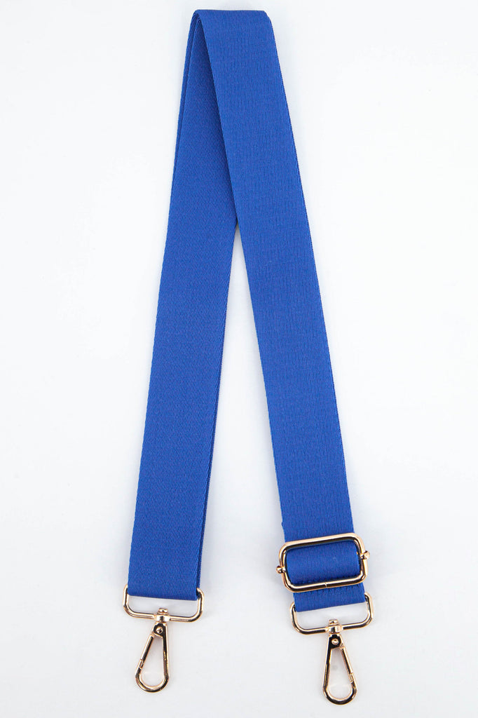 plain blue clip on bag strap in a textured orange woven material with gold hardware