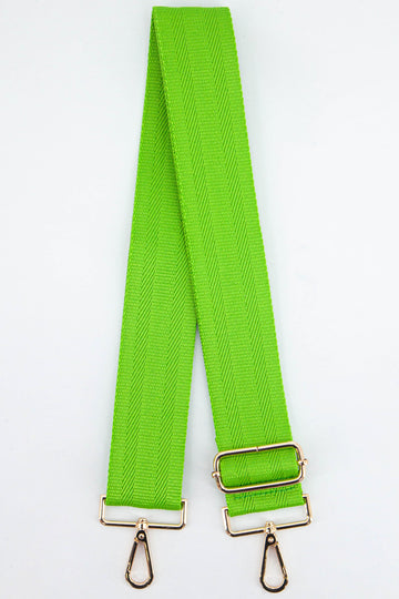 plain bright lime green clip on bag strap in a textured orange woven material with gold hardware