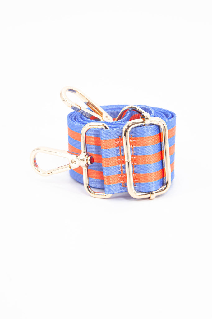 close up of the alternating blue and orange stripe pattern and gold adjustment buckle