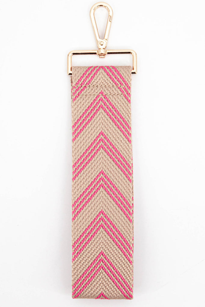 pink chevron pattern clutch bag wrist strap with gold snap hook attachment