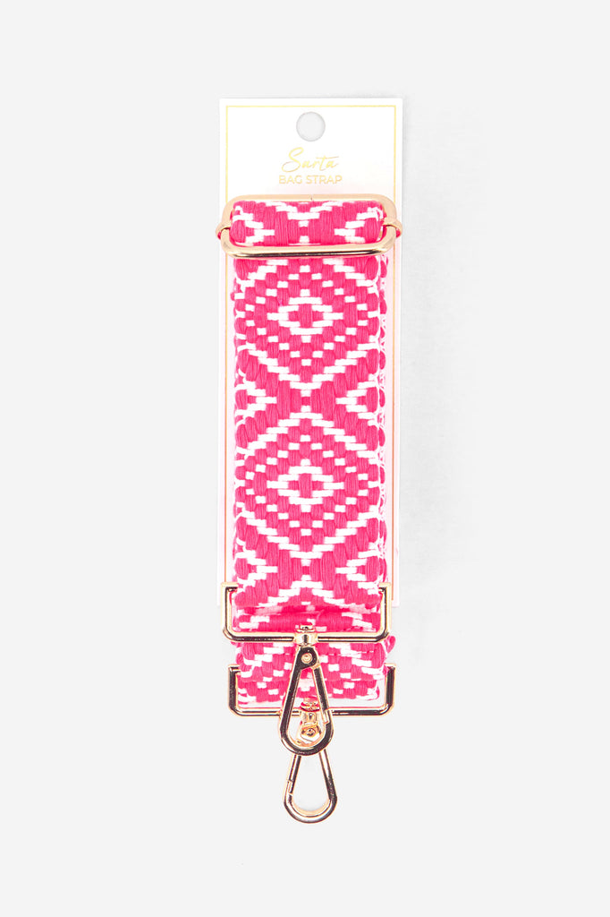 close up of the pink and white ikat pattern on the woven replacement bag strap