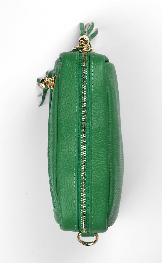 showing the green camera bag from above showing the zip closure