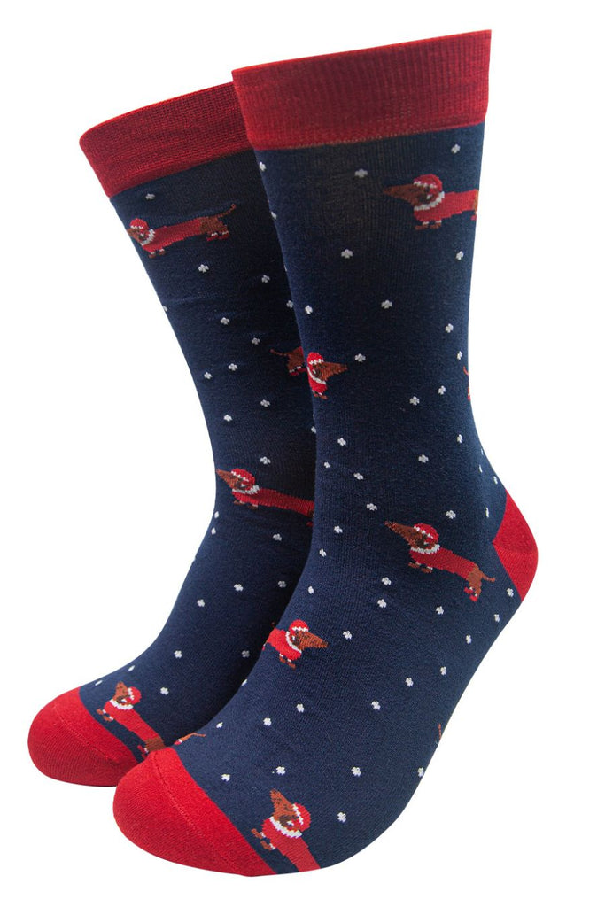navy blue dress socks featuring dachshunds wearing santa hats