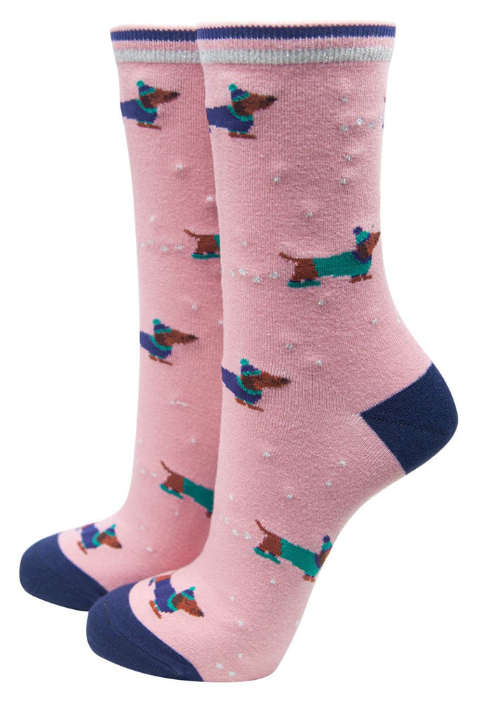 pink bamboo socks with sausage dogs on them